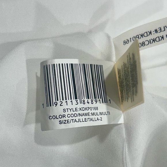 💜”Kensie” White & Purple Floral Dress w/Crisscross Neckline Detailing - Picture 13 of 17